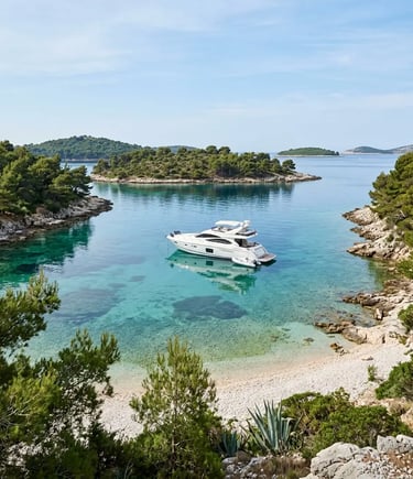 Luxury yacht anchored in a secluded Pakleni Islands cove with clear turquoise water