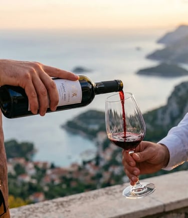 Sommelier pouring Croatian Plavac Mali red wine with Adriatic coastline view at golden hour