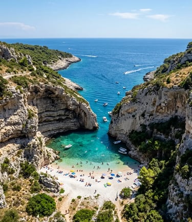 Aerial view of Stiniva Beach hidden between dramatic cliff walls on Vis island, Croatia