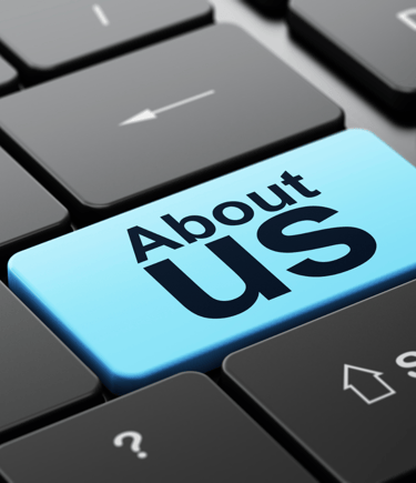 a keyboard with a blue button on it for About Us section CleanX Pro