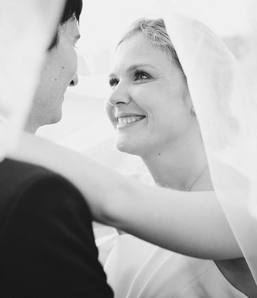 Black and white bride and groom under veil — fine art wedding photographer South of France