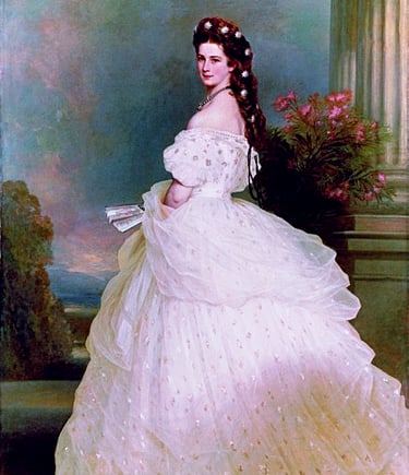 Portrait of Empress Elisabeth of Austria in a white gown with star-shaped diamonds in her hair.