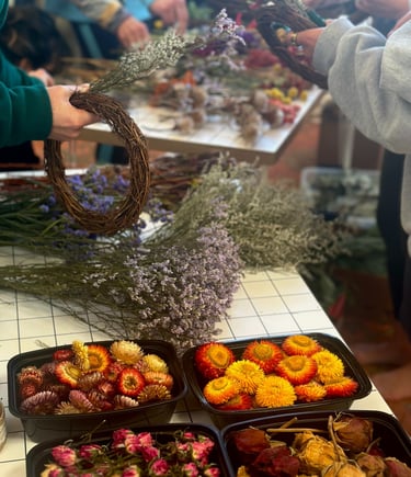 people participating in a wreath making workshop