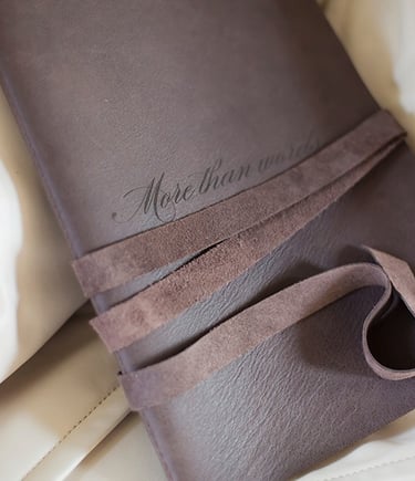 a leather bound notebook with a leather cover