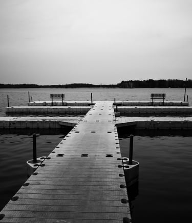 a dock with benches on the Chippewa foliage
