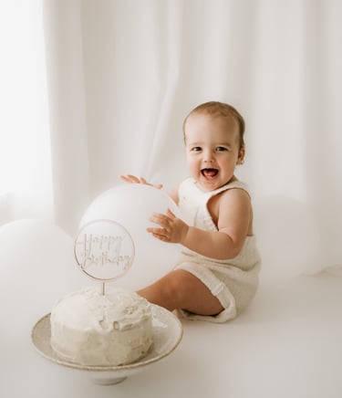 toddler with his 1st birthday cake in Adelaide Hills studio
