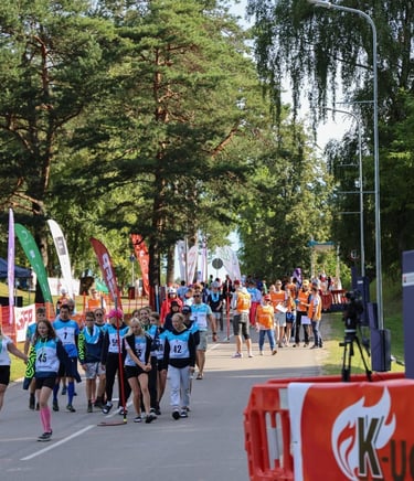 a group of people running in a race