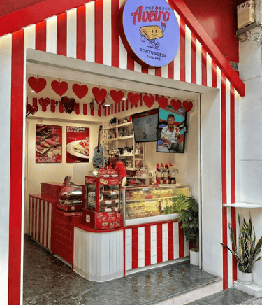 Aveiro Macau storefront with red and white stripes