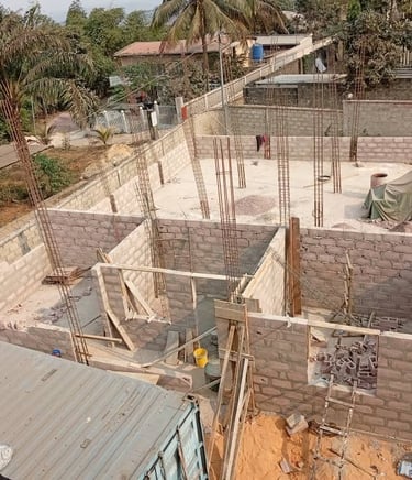 a construction site with a concrete wall and a concrete wall