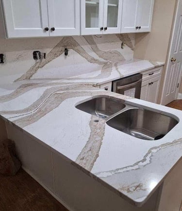 Quartz countertop with subtle marbling in transitional kitchen design