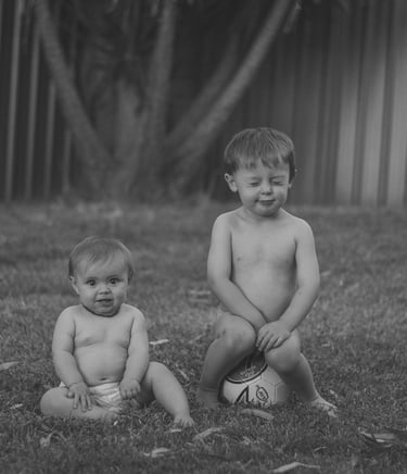 brother & sister in backyard ina lifestyle photo session in Adelaide Hills