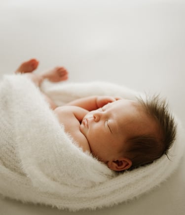 newborn sleeping photographed in natural light studio Littlehampton