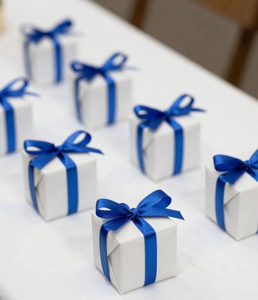 Elegant wrapped wedding gift with soft blue ribbon on a light beige background.