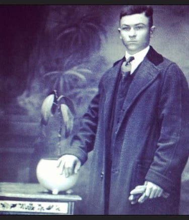 black and white photo of a young Italian man posing for a picture