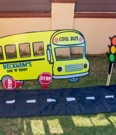 party props of s school bus stop sign with a school bus sign