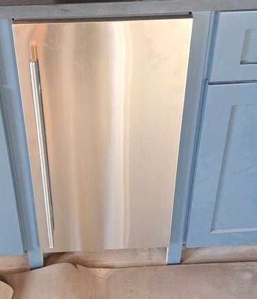 shows beautiful, finished install of an ice maker