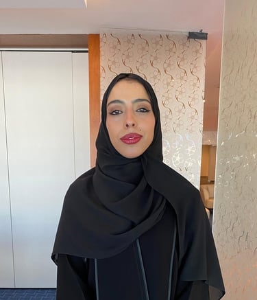 a woman in a black dress and a black dress