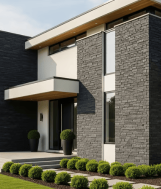 a house with a black and white stone exterior