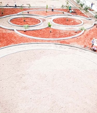 Green buffers and planned open spaces in plot layout by Garden Designers