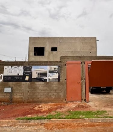 a building with a red door and a sign that says,'do not enter