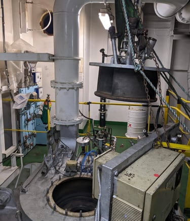 Removal of burner top cover in dry dock for inspection