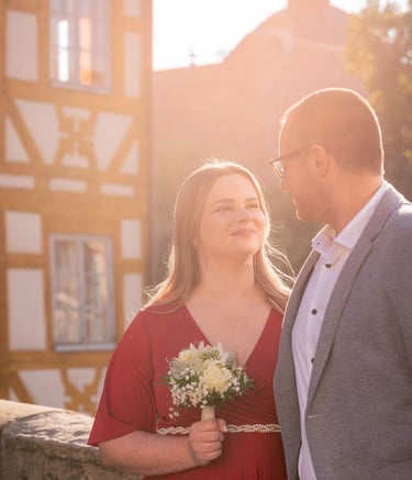 a man and woman standing next to each other