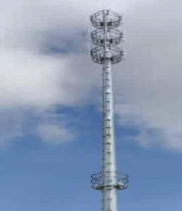 a tall tower with a large metal structure