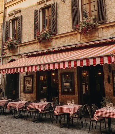 a restaurant with tables and chairs outside
