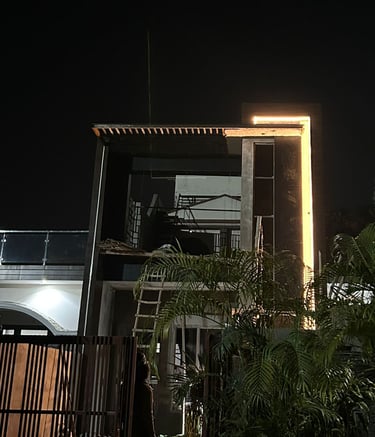 a building with a clock tower in the middle of the night