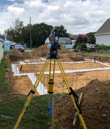 a tripod with a tripod and a camera
