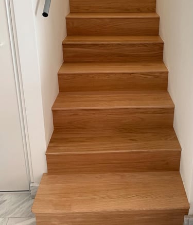 a staircase case with a wooden staircase case