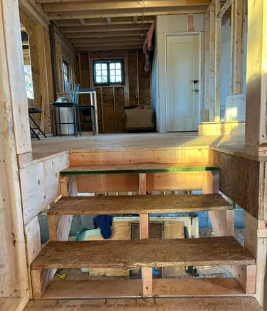 a room with a ladder and a ladder