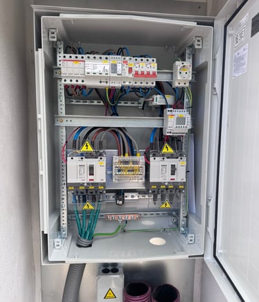 a box with a bunch of wires and a hose