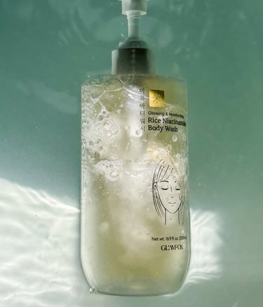 a bottle of liquid soap in a glass container UGC