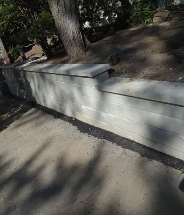 Retaining wall made with travertine stone provided by Longfield masonry in central Montreal