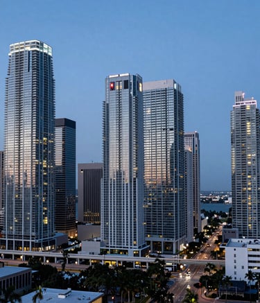 A panoramic view of the Miami skyline at dusk, highlighting energy-efficient skyscrapers. The overall tone is cool and blue, representing perfect climate control on a city-wide scale. Professional architectural photography style.