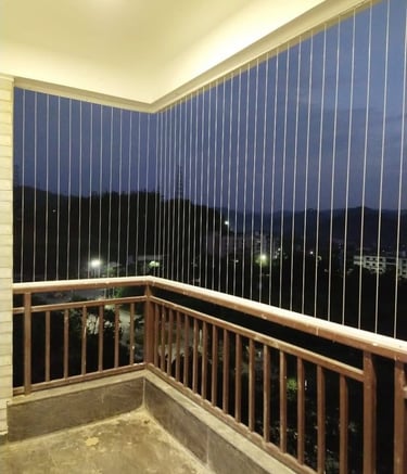 Side angle showing the minimal frame of an invisible grill on a residential window.