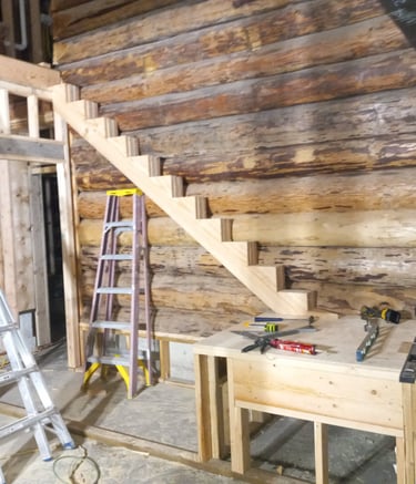 installing stair in log barn dominium 