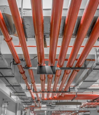 a long row of pipes in a building