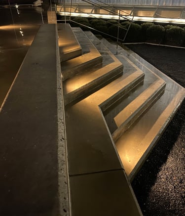concrete steps illuminated with step lights