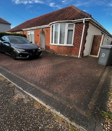 Pressure washing brick weave driveway in Norwich Norfolk by PJB Exterior Cleaning
