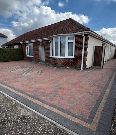 Professional cleaning of brick weave driveway using pressure washing in Norwich Norfolk