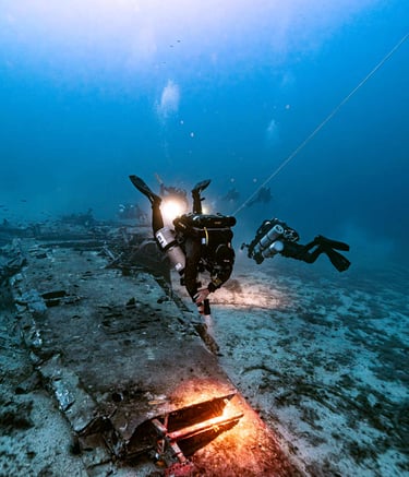 technical divers exploring a plane wreck in Malta. Damian Xuereb is the diver using a CCR rebreather