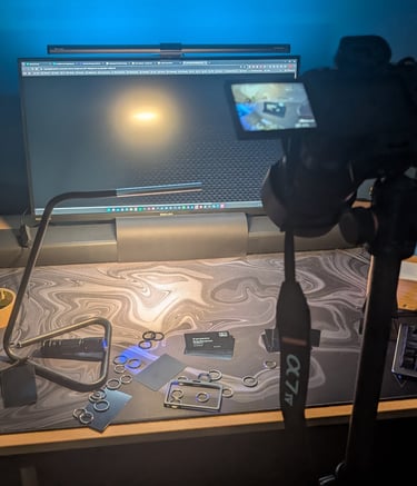 Professional desk setup with a Sony mirrorless camera on a tripod for overhead video recording.