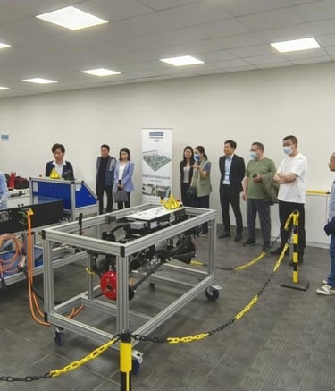 a group of people from other countries visit the lab