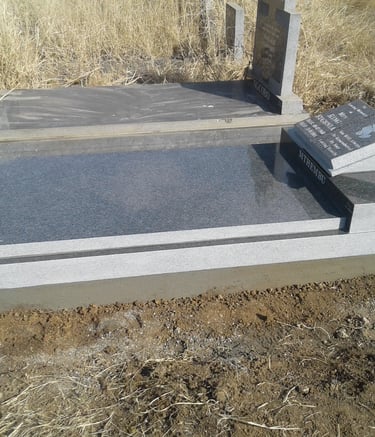 Flat bible headstone fitted with a ledger