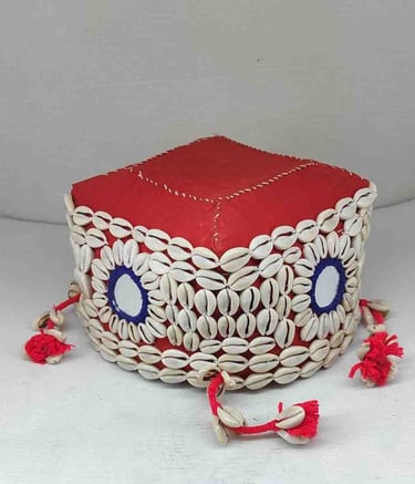 "Bamboo basket with red textile wrap, ornamental shell design, and artificial flower–Export-grade"