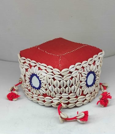 "Bamboo basket with red textile wrap, ornamental shell design, and artificial flower–Export-grade"