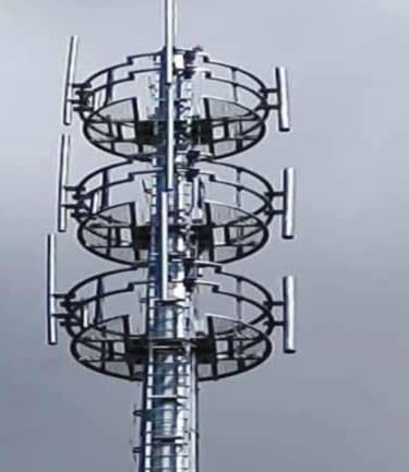 a cell phone tower with a sky background