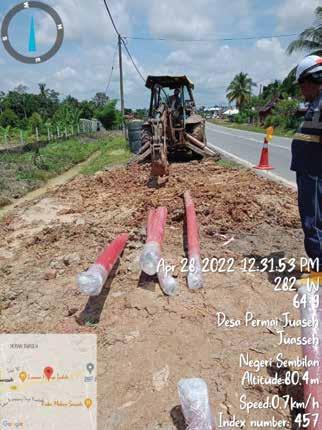 a man in a helmet and a helmet on a construction site